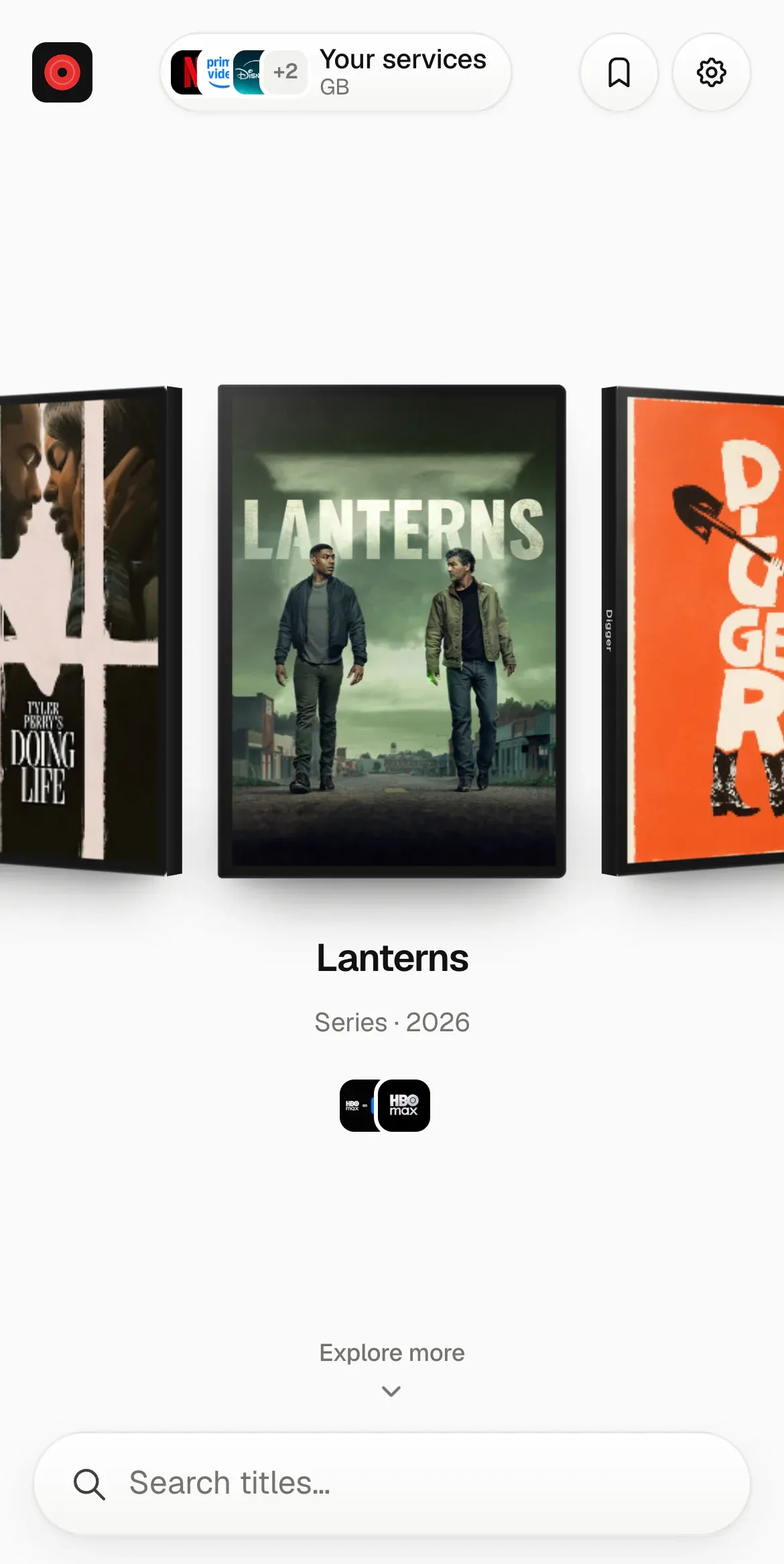 MovieVault on an iPhone: one DVD case in the middle of the ring with its title, and the search dock at the bottom